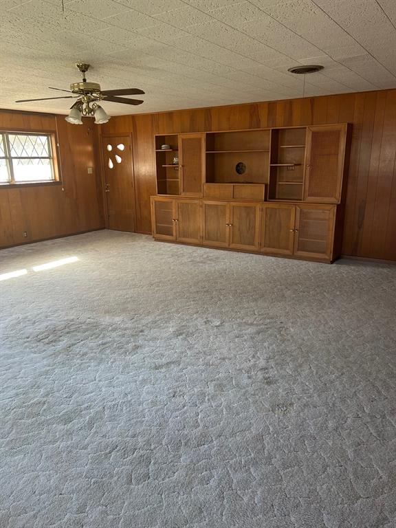 910 South Varella Street Mexia, TX 76667 - Photo 14 of 14 a view of a livingroom with an empty space and a window