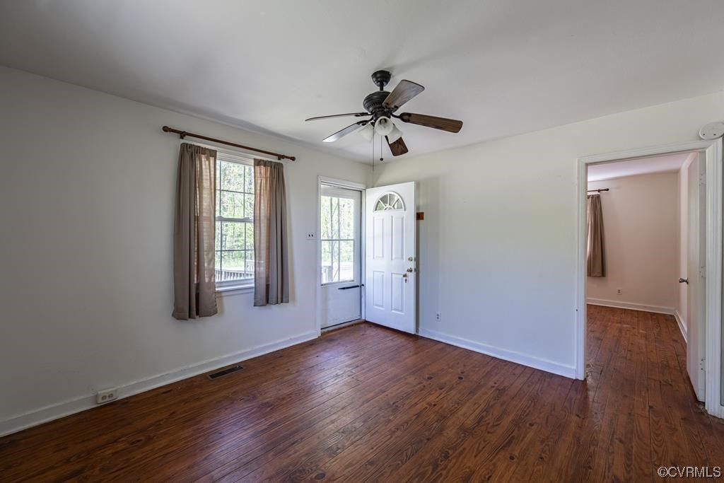 2153 Featherfin Road Prospect, VA 23960 - Photo 3 of 12 a view of an empty room with wooden floor and a window