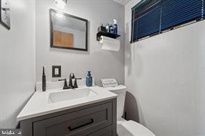 503 Bonsall Avenue Lansdowne, PA 19050 - Photo 20 of 24 a bathroom with a sink a toilet and mirror