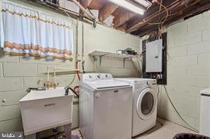 503 Bonsall Avenue Lansdowne, PA 19050 - Photo 21 of 24 a utility room with dryer and washer