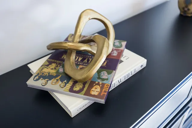 a vase of flowers sitting on a table