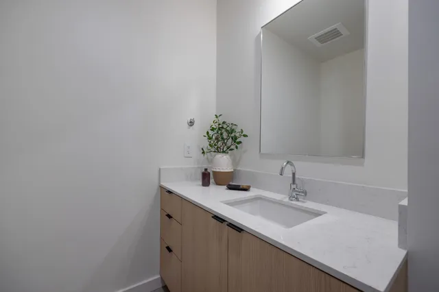 a view of a backyard with sitting area and furniture