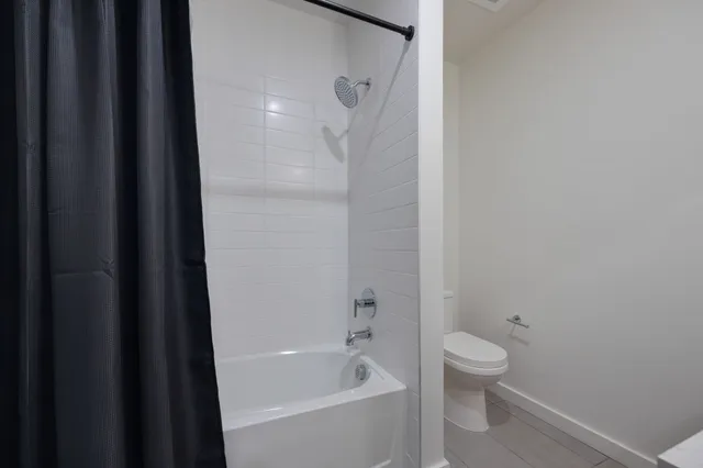 a view of a house with pool and chairs
