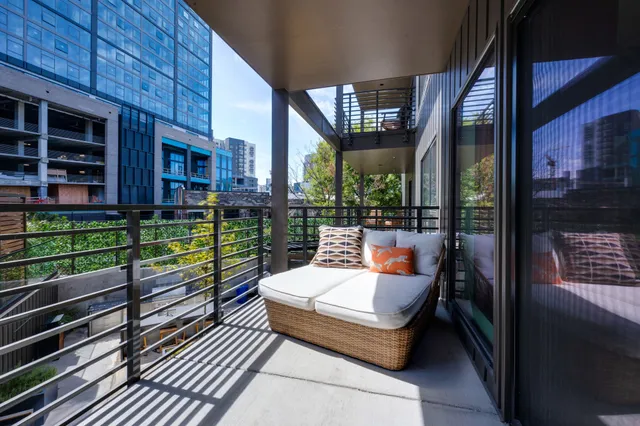 a view of kitchen with a sink and a table and chairs