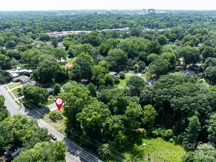 an aerial view of residential house with outdoor space and street view