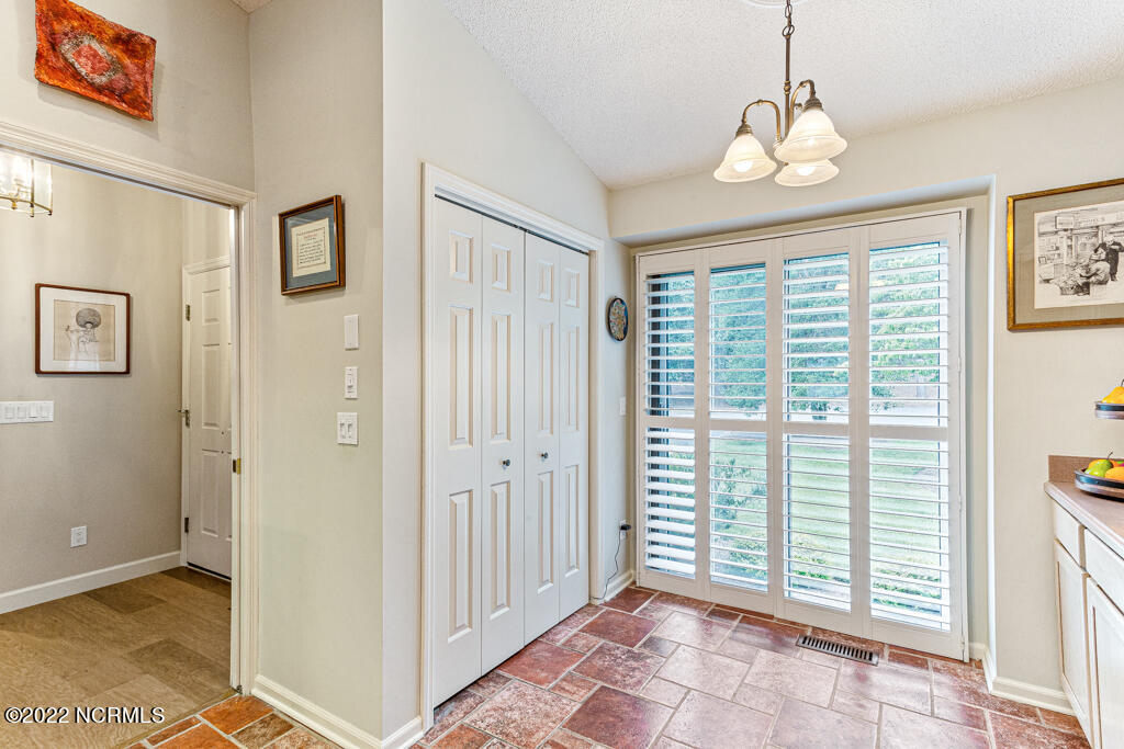 4 Lake Pinehurst Villas Road Pinehurst, NC 28374 - Photo 15 of 56 Large Pantry and big windows provide natural light into the kitchen