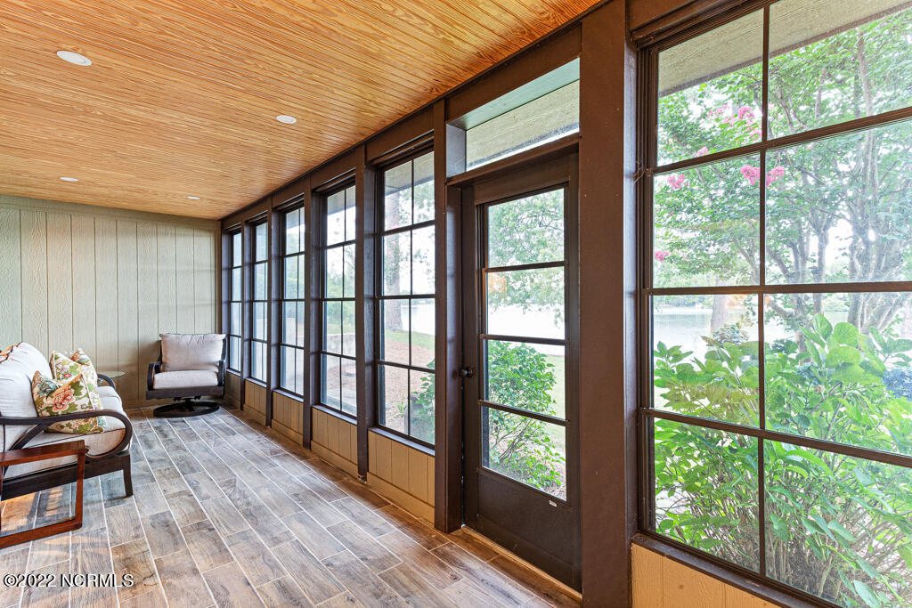 4 Lake Pinehurst Villas Road Pinehurst, NC 28374 - Photo 34 of 56 Newly remodeled Carolina room with Eze Breeze windows in 2020