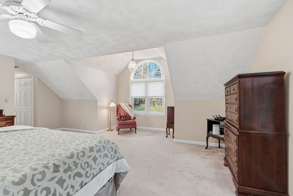 33 Overlook Drive Groton, MA 01450 - Photo 22 of 41 a bedroom with a bed furniture and a window