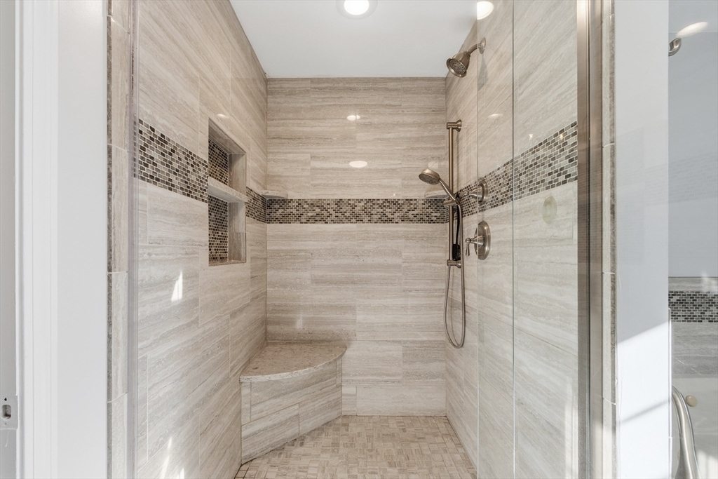 33 Overlook Drive Groton, MA 01450 - Photo 25 of 41 a bathroom with a glass shower door