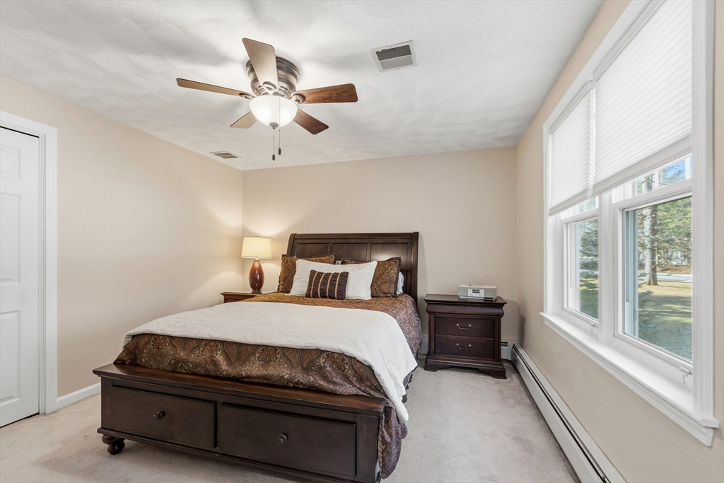 33 Overlook Drive Groton, MA 01450 - Photo 28 of 41 a bedroom with a bed and window