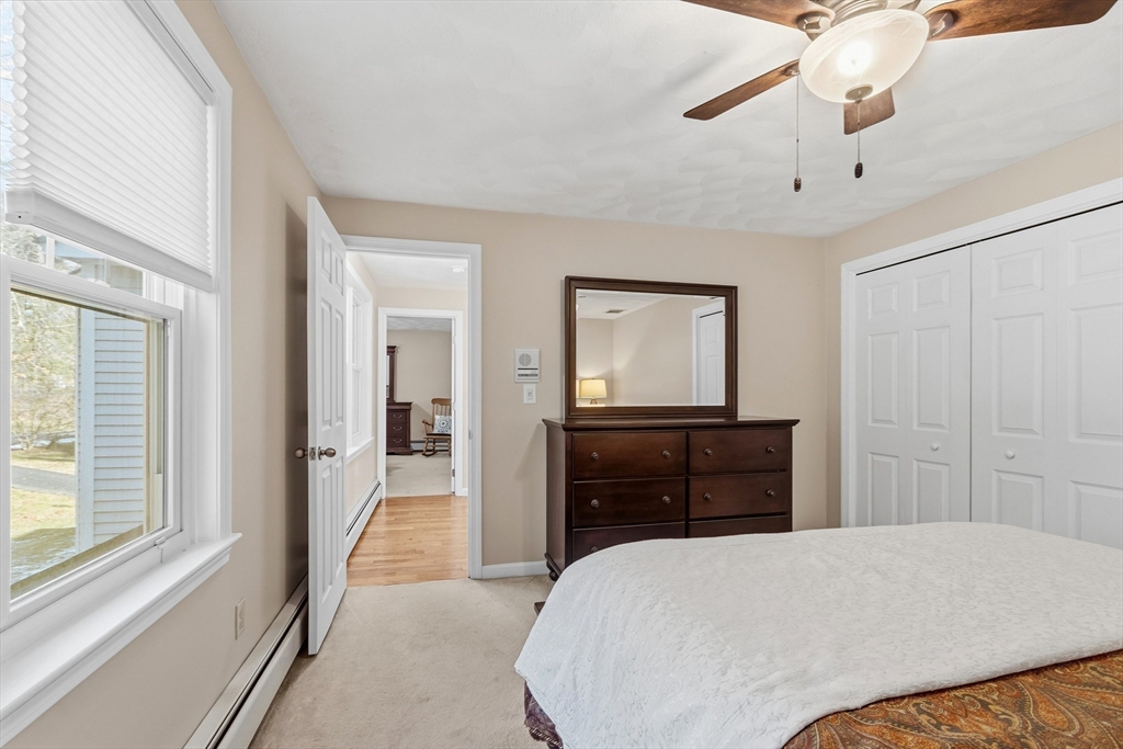 33 Overlook Drive Groton, MA 01450 - Photo 29 of 41 a bedroom with a bed and a dresser