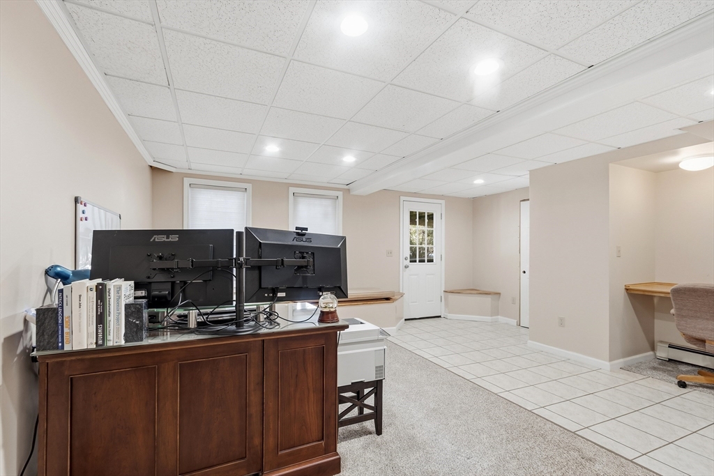 33 Overlook Drive Groton, MA 01450 - Photo 32 of 41 a kitchen with a sink cabinets and wooden floor