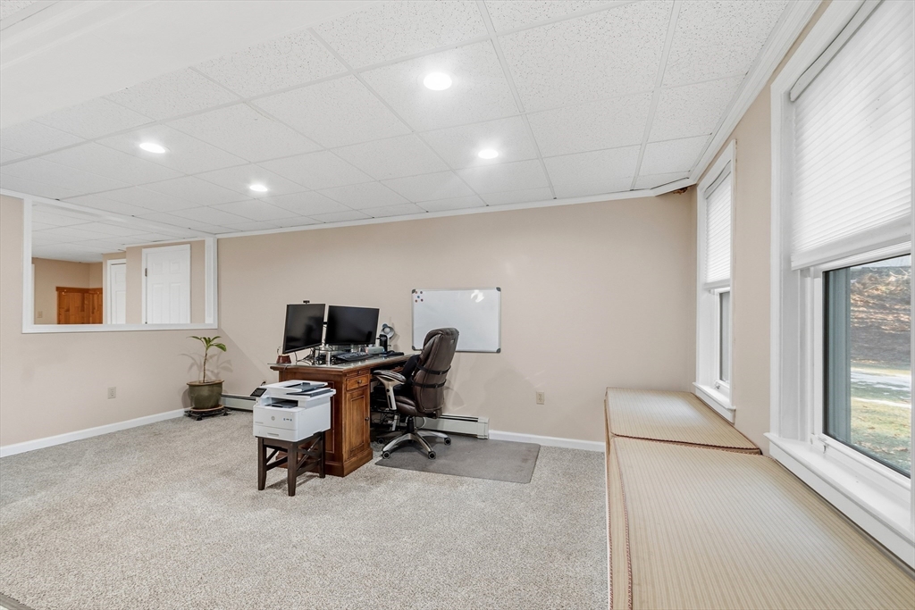 33 Overlook Drive Groton, MA 01450 - Photo 33 of 41 a view of a workspace with furniture and a window