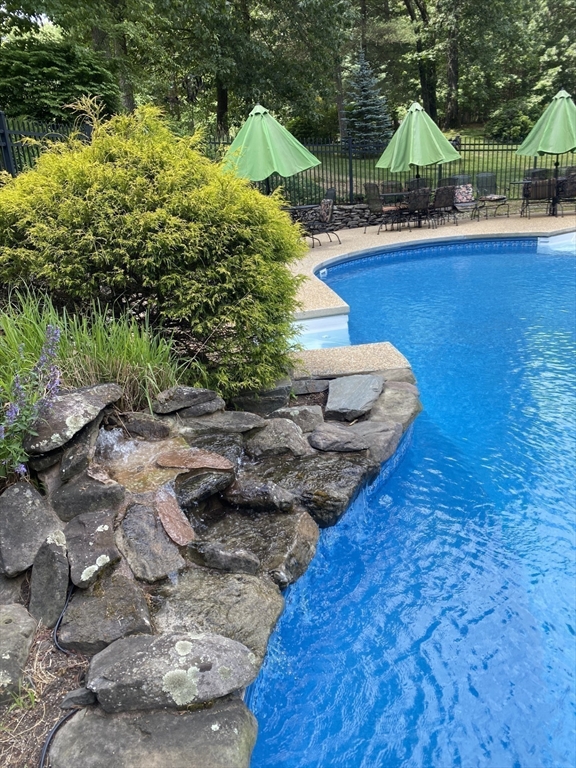 33 Overlook Drive Groton, MA 01450 - Photo 39 of 41 a backyard of a house with lots of green space