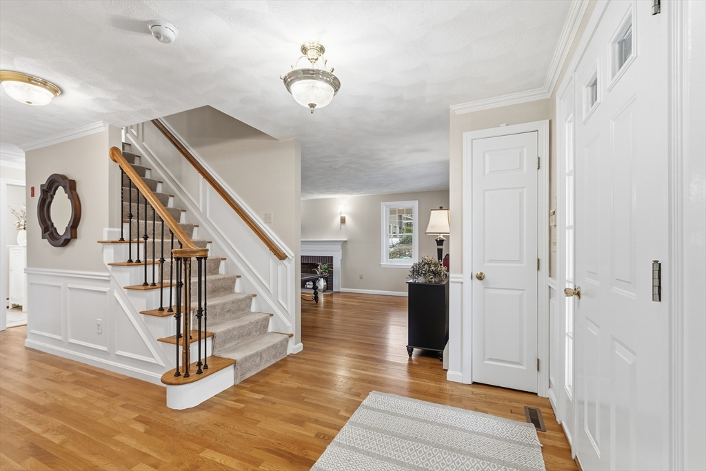 33 Overlook Drive Groton, MA 01450 - Photo 5 of 41 a view of entryway and hall with wooden floor
