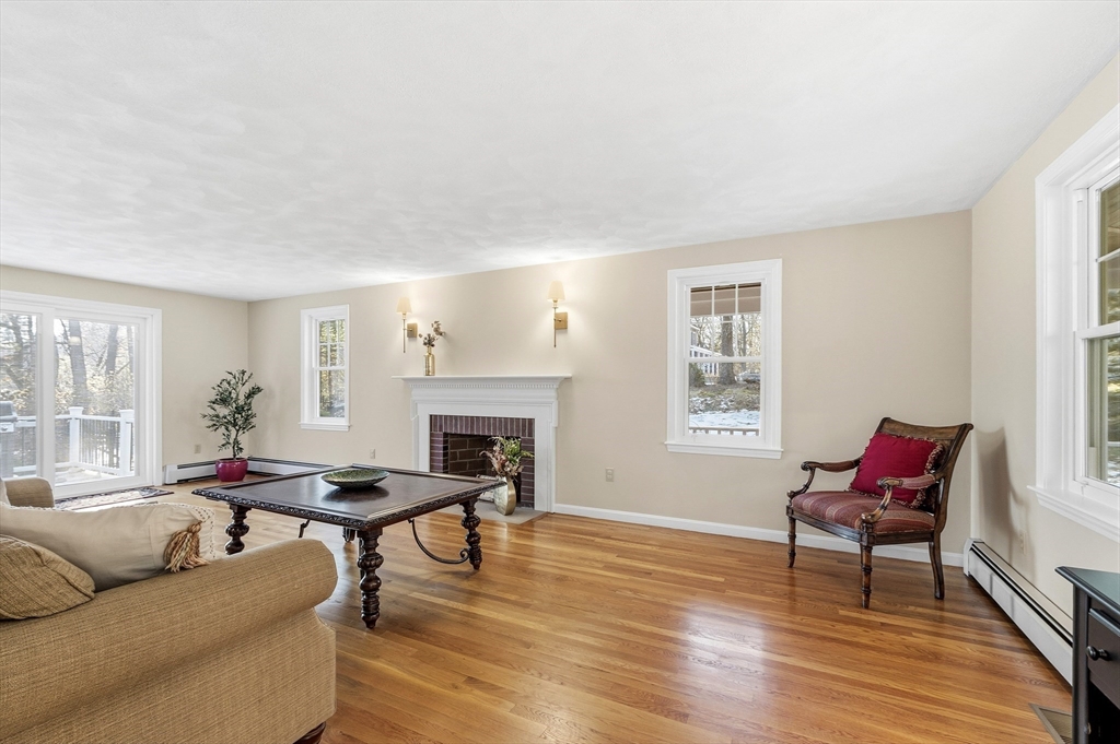 33 Overlook Drive Groton, MA 01450 - Photo 7 of 41 a living room with furniture and a fireplace