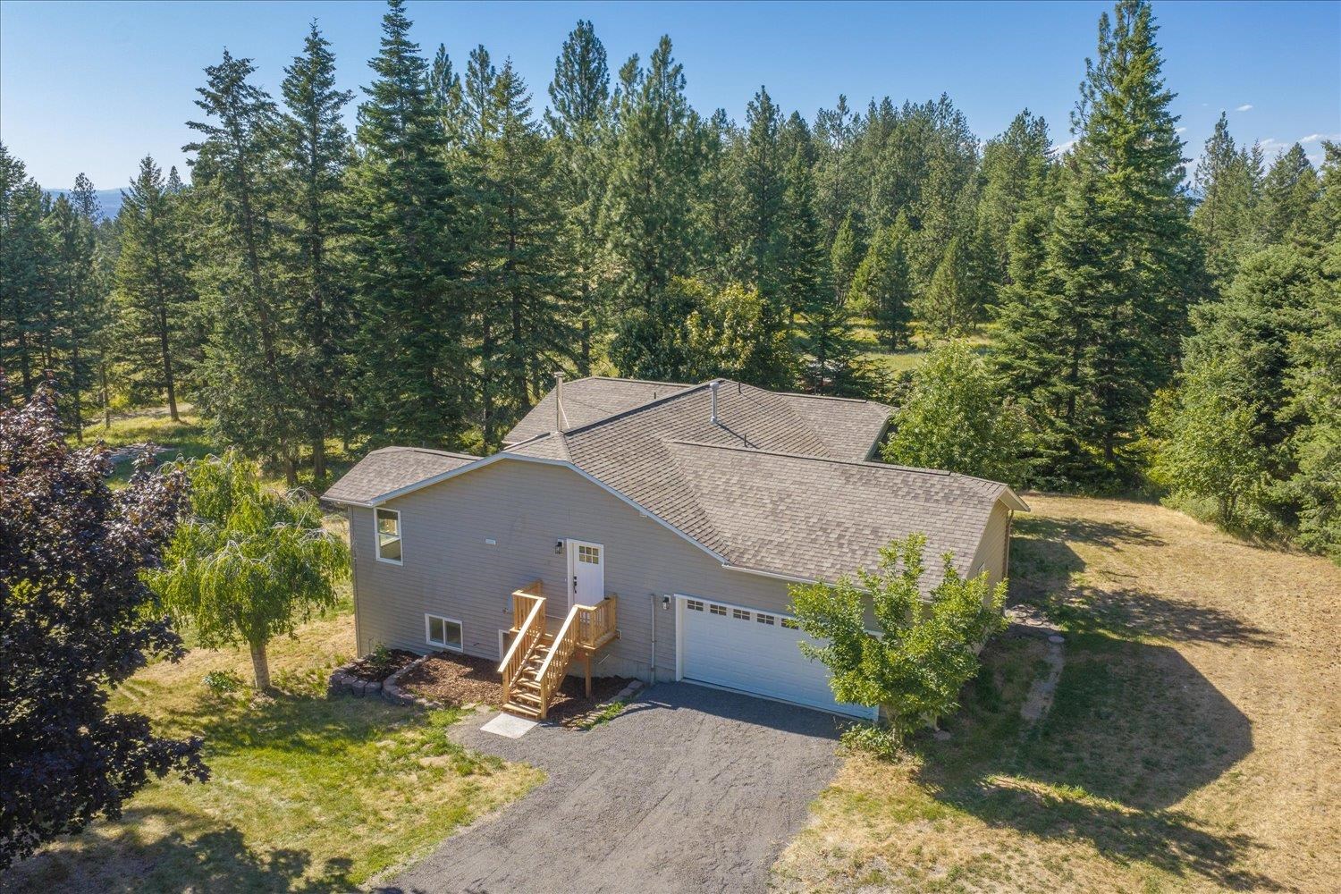 15519 East Tallman Road Chattaroy, WA 99003 - Photo 1 of 49
