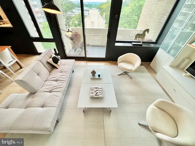 a view of a living room with a rug
