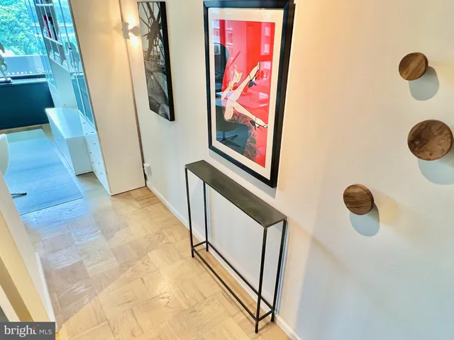 a bathroom with a shower and sink