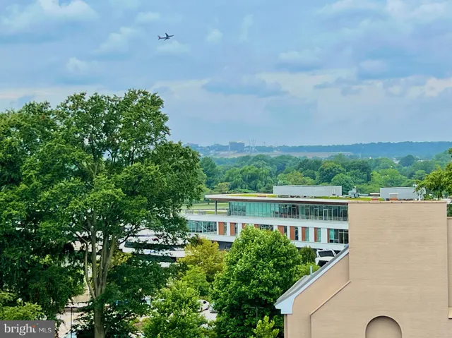 an aerial view of house with yard