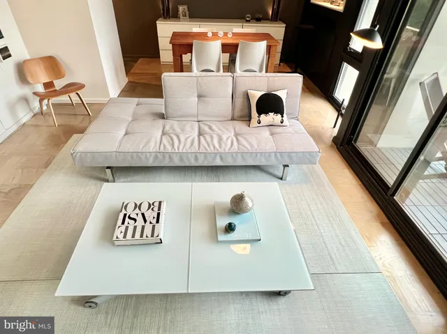 a living room with furniture and a table