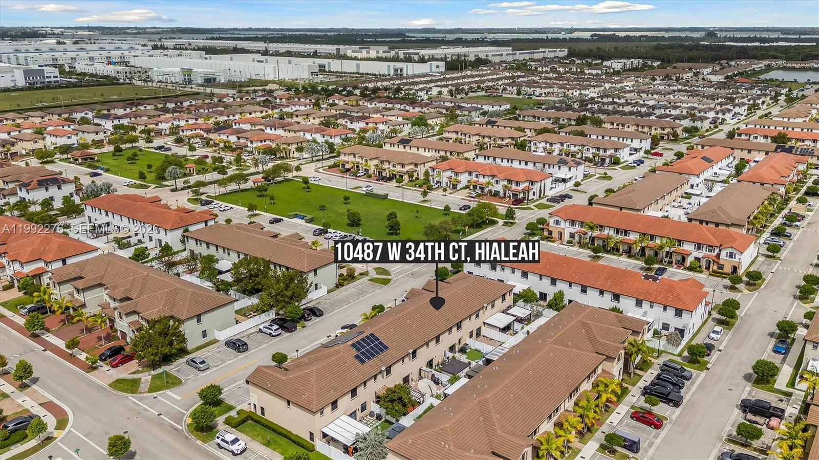 10487 West 34th Court Hialeah, FL 33018 - Photo 38 of 57 an aerial view of a city