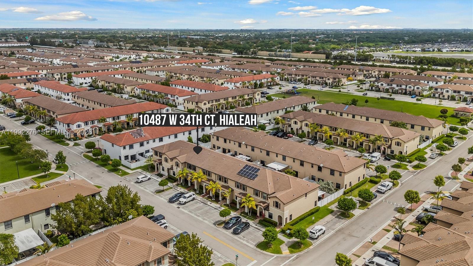 10487 West 34th Court Hialeah, FL 33018 - Photo 40 of 57 an aerial view of a city