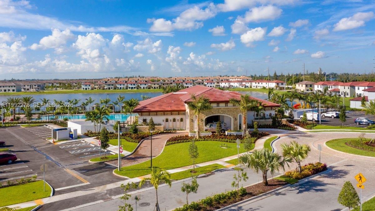 10487 West 34th Court Hialeah, FL 33018 - Photo 44 of 57 a view of a swimming pool and lounge chairs