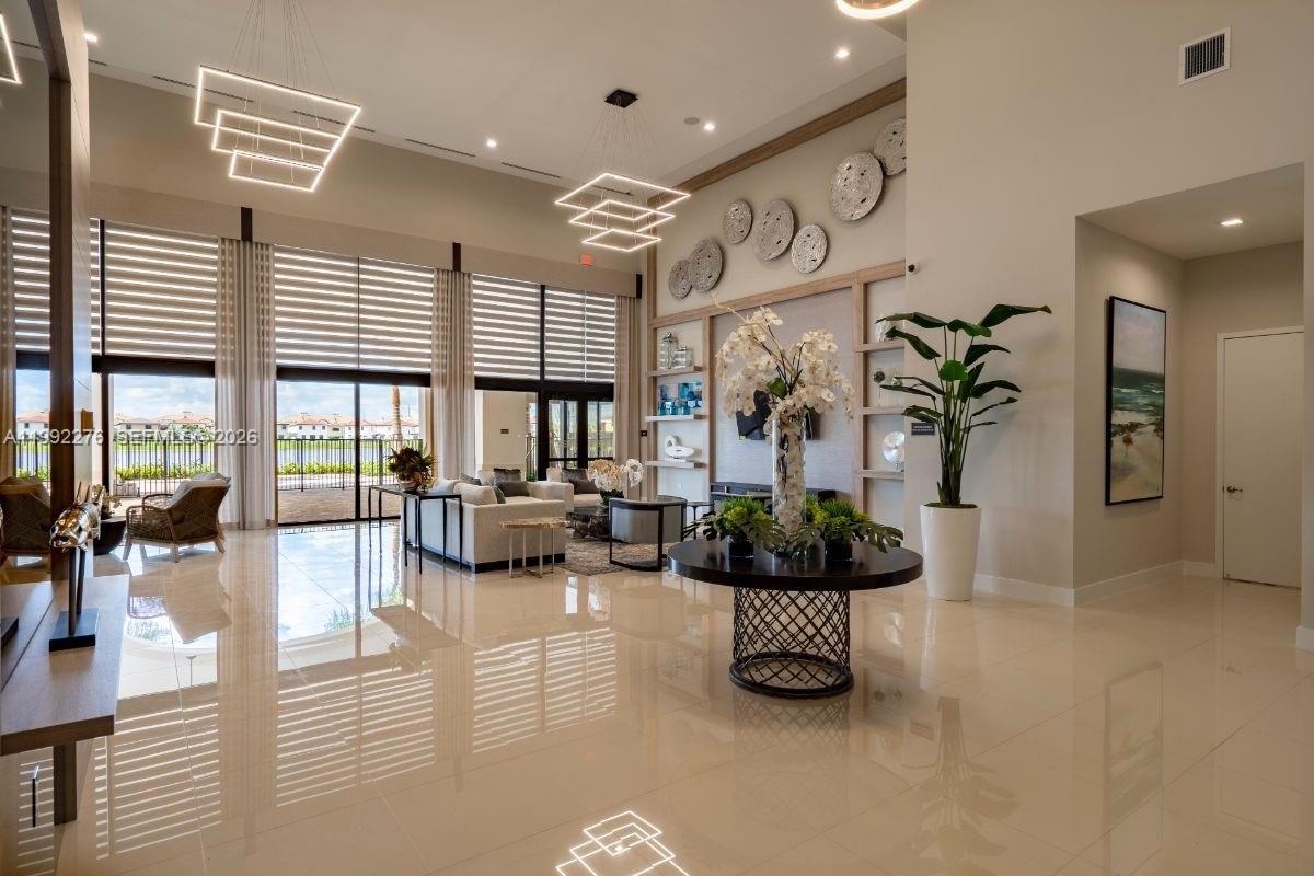 10487 West 34th Court Hialeah, FL 33018 - Photo 46 of 57 a living room with furniture and a large window