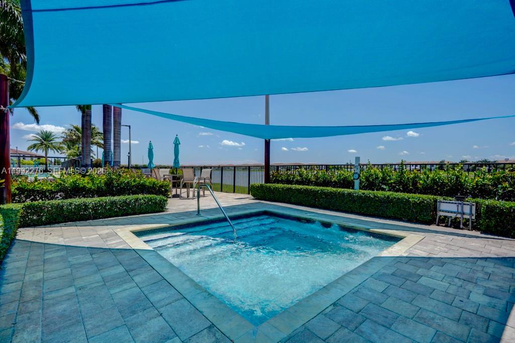 10487 West 34th Court Hialeah, FL 33018 - Photo 52 of 57 a view of a swimming pool with a yard