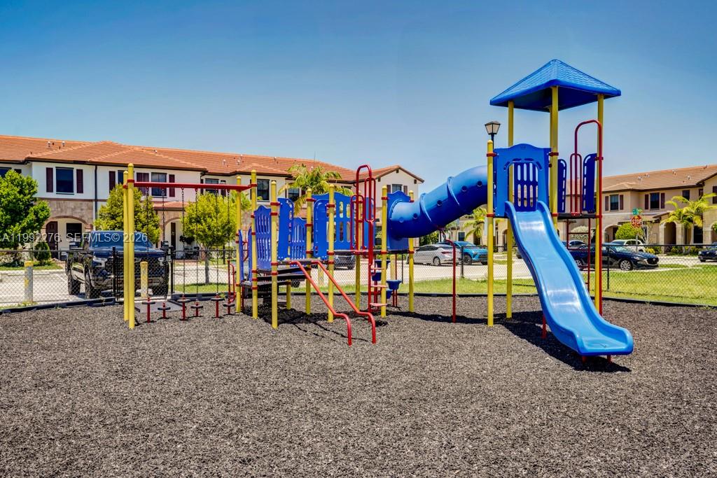 10487 West 34th Court Hialeah, FL 33018 - Photo 56 of 57 a view of a park with slide