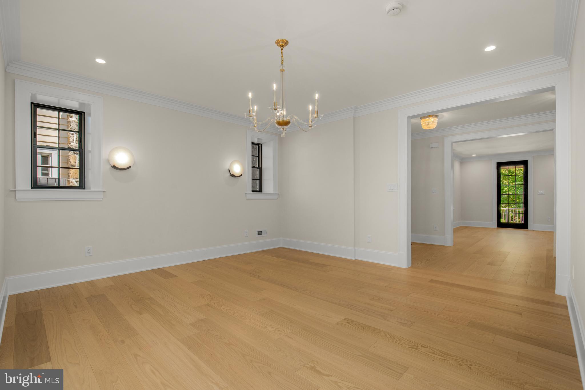 2710 36th Street Northwest Washington, DC 20007 - Photo 10 of 29 an empty room with closet and windows