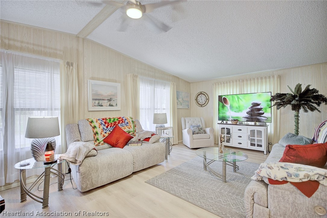 1571 Caribbean Road Sebring, FL 33870 - Photo 5 of 41 a bedroom with furniture and a window