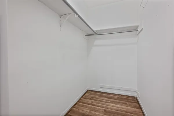a view of a room with empty racks on the wall