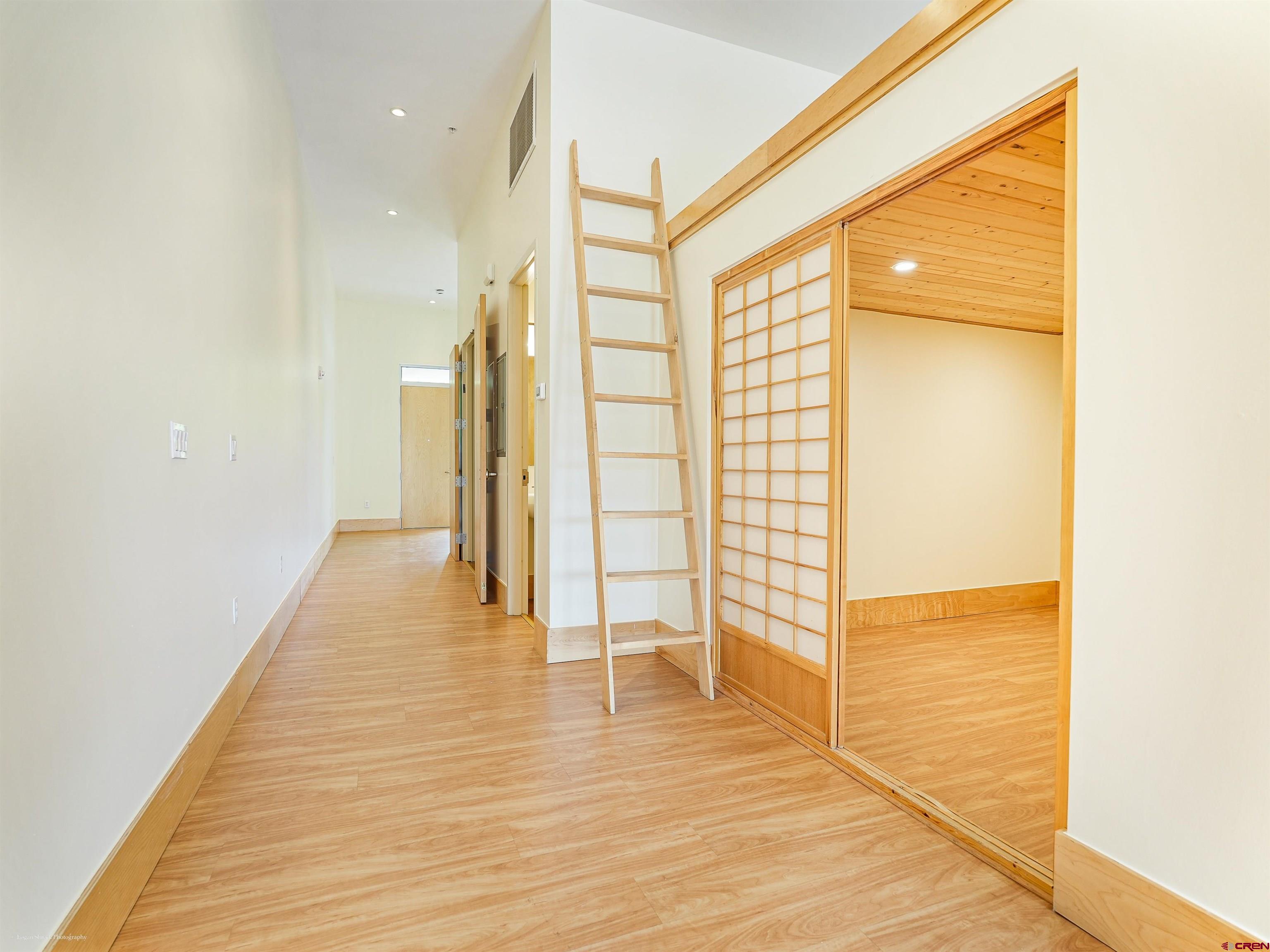 555 Rivergate Lane, Unit B2139 Durango, CO 81301 - Photo 21 of 32 a view of a room with wooden floor and next to a window