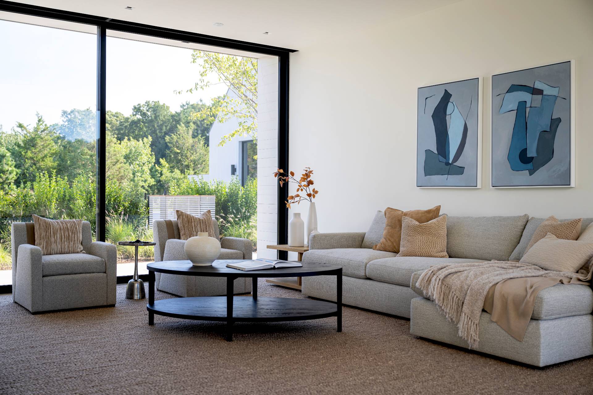 1 Pandion Road Shelter Island, NY 11964 - Photo 16 of 32 a living room with furniture and a large window