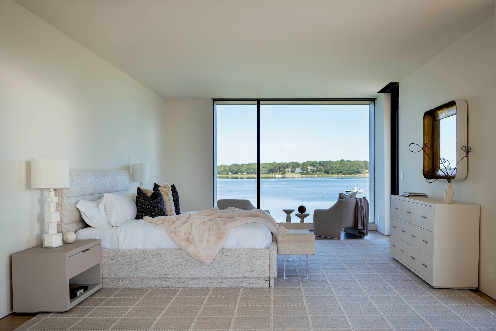 1 Pandion Road Shelter Island, NY 11964 - Photo 17 of 32 a living room with furniture and large windows