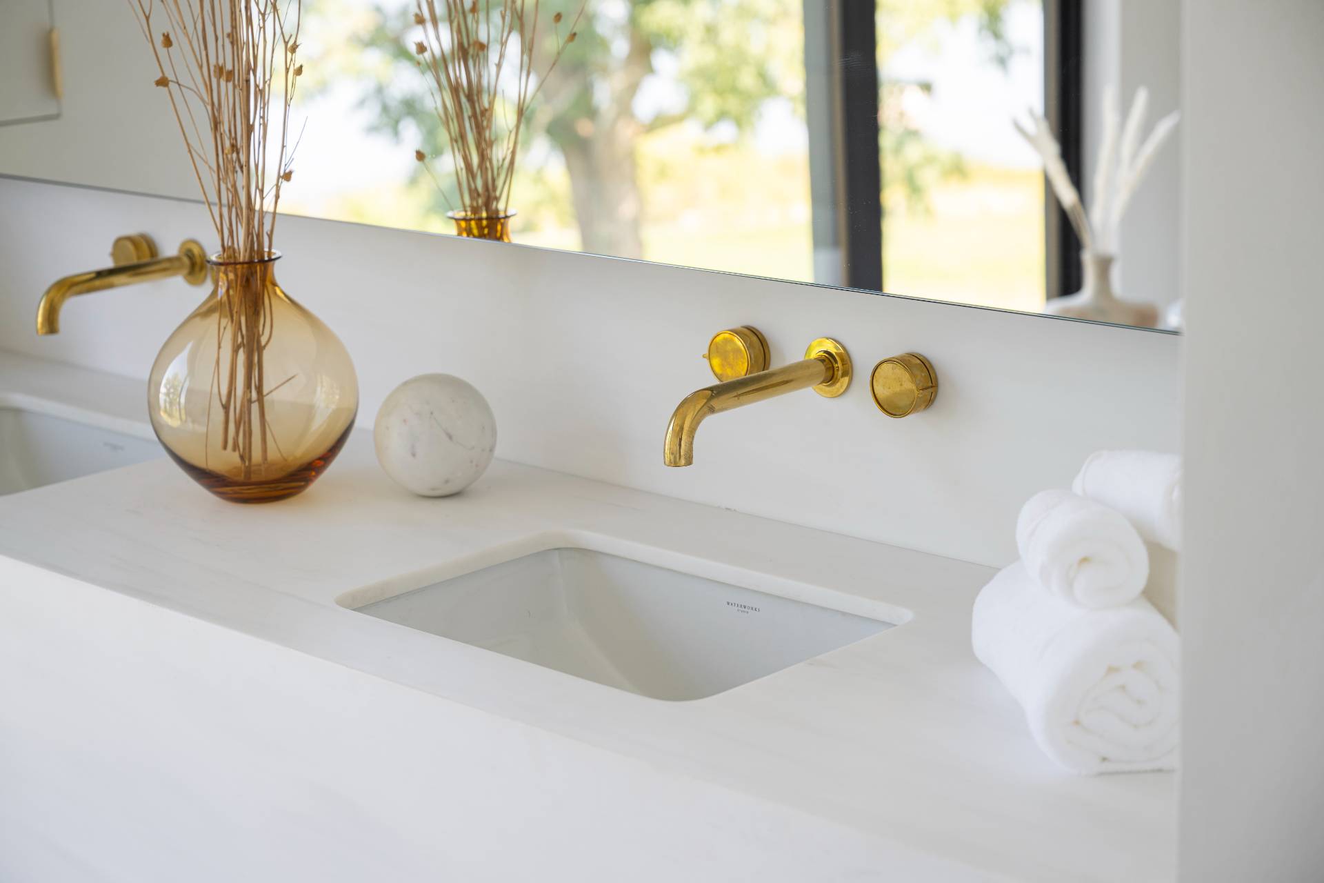 1 Pandion Road Shelter Island, NY 11964 - Photo 20 of 32 a bathroom with a sink and a mirror