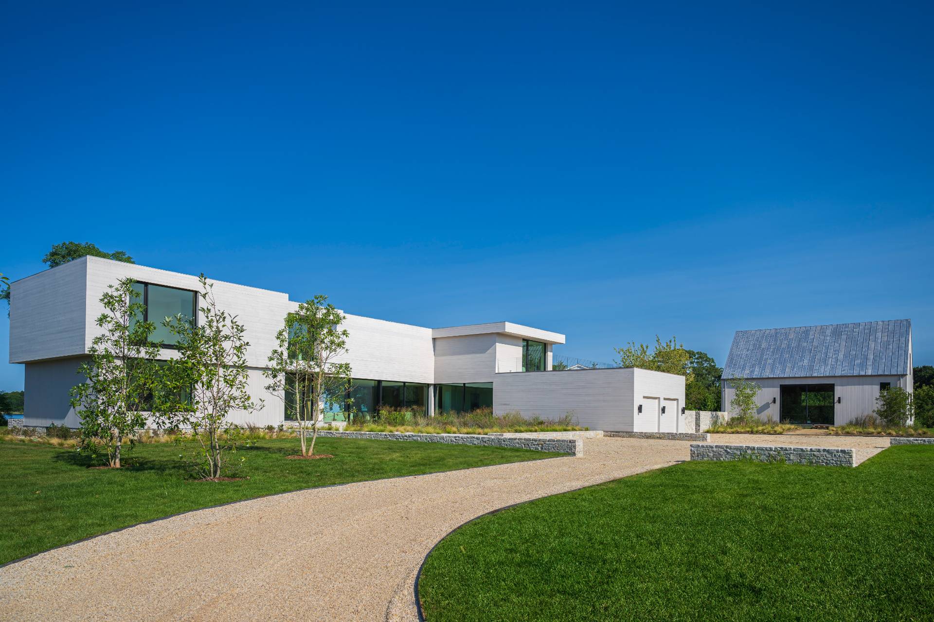 1 Pandion Road Shelter Island, NY 11964 - Photo 2 of 32 a view of a house with a yard and table