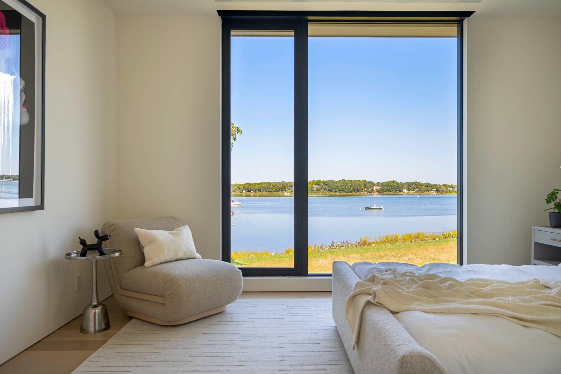 1 Pandion Road Shelter Island, NY 11964 - Photo 24 of 32 a bedroom with a bed and a window