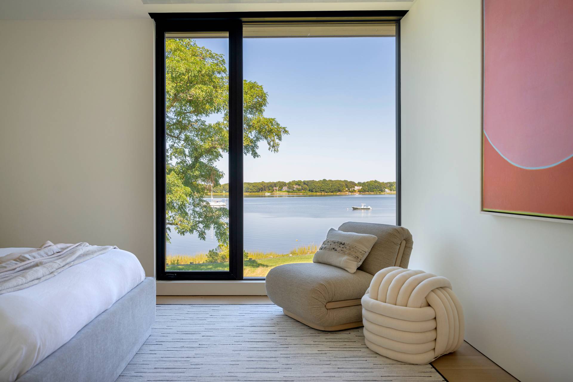 1 Pandion Road Shelter Island, NY 11964 - Photo 25 of 32 a living room with furniture and a floor to ceiling window