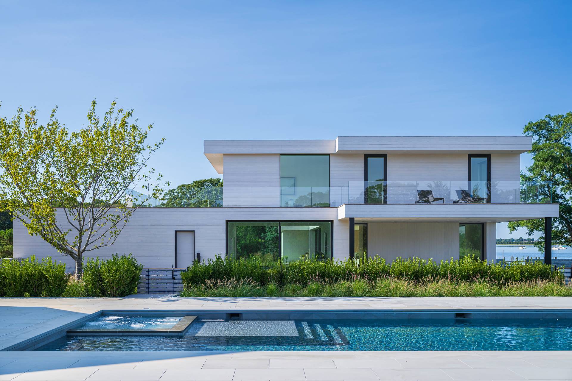 1 Pandion Road Shelter Island, NY 11964 - Photo 4 of 32 front view of a house with a yard