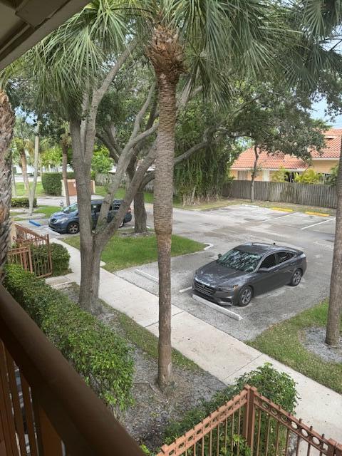 3939 Northeast 5th Avenue, Unit B203 Boca Raton, FL 33431 - Photo 12 of 15 a view of a park with large tree