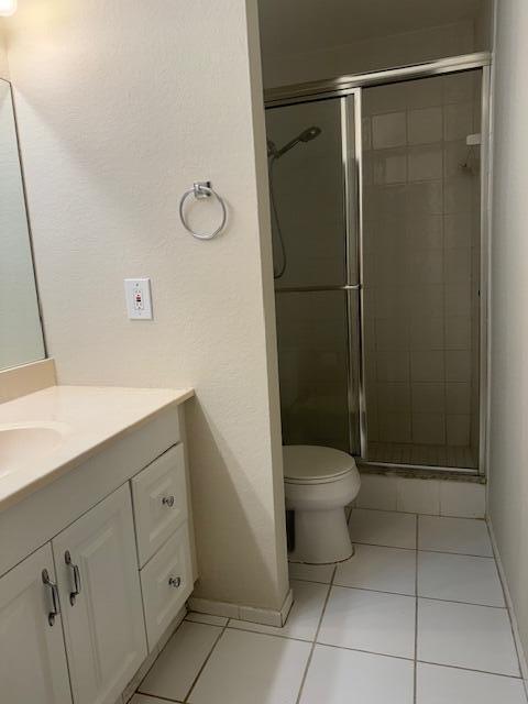 3939 Northeast 5th Avenue, Unit B203 Boca Raton, FL 33431 - Photo 15 of 15 a bathroom with a toilet sink and shower
