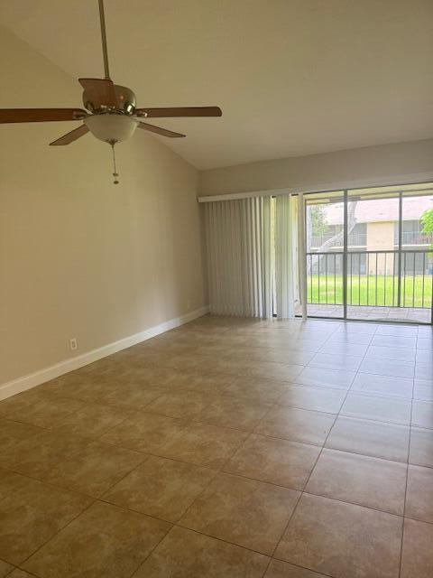 3939 Northeast 5th Avenue, Unit B203 Boca Raton, FL 33431 - Photo 6 of 15 a view of an empty room with a window