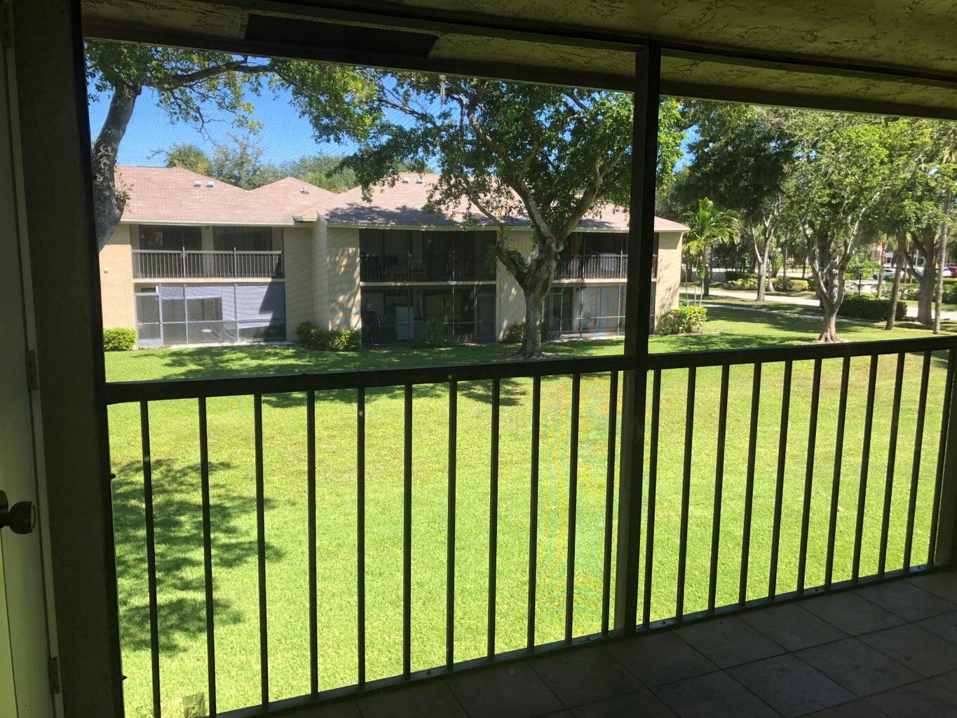 3939 Northeast 5th Avenue, Unit B203 Boca Raton, FL 33431 - Photo 7 of 15 a view of a porch