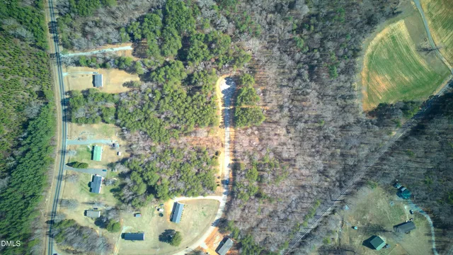 a backyard of a building with lots of green space