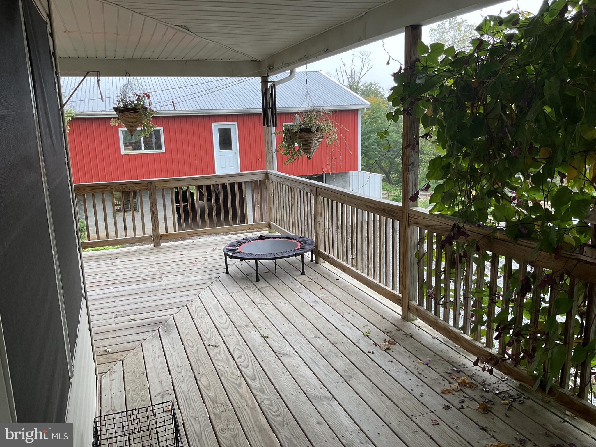 116 Keys Road Peach Bottom, PA 17563 - Photo 54 of 90 a view of balcony with wooden floor and barbeque