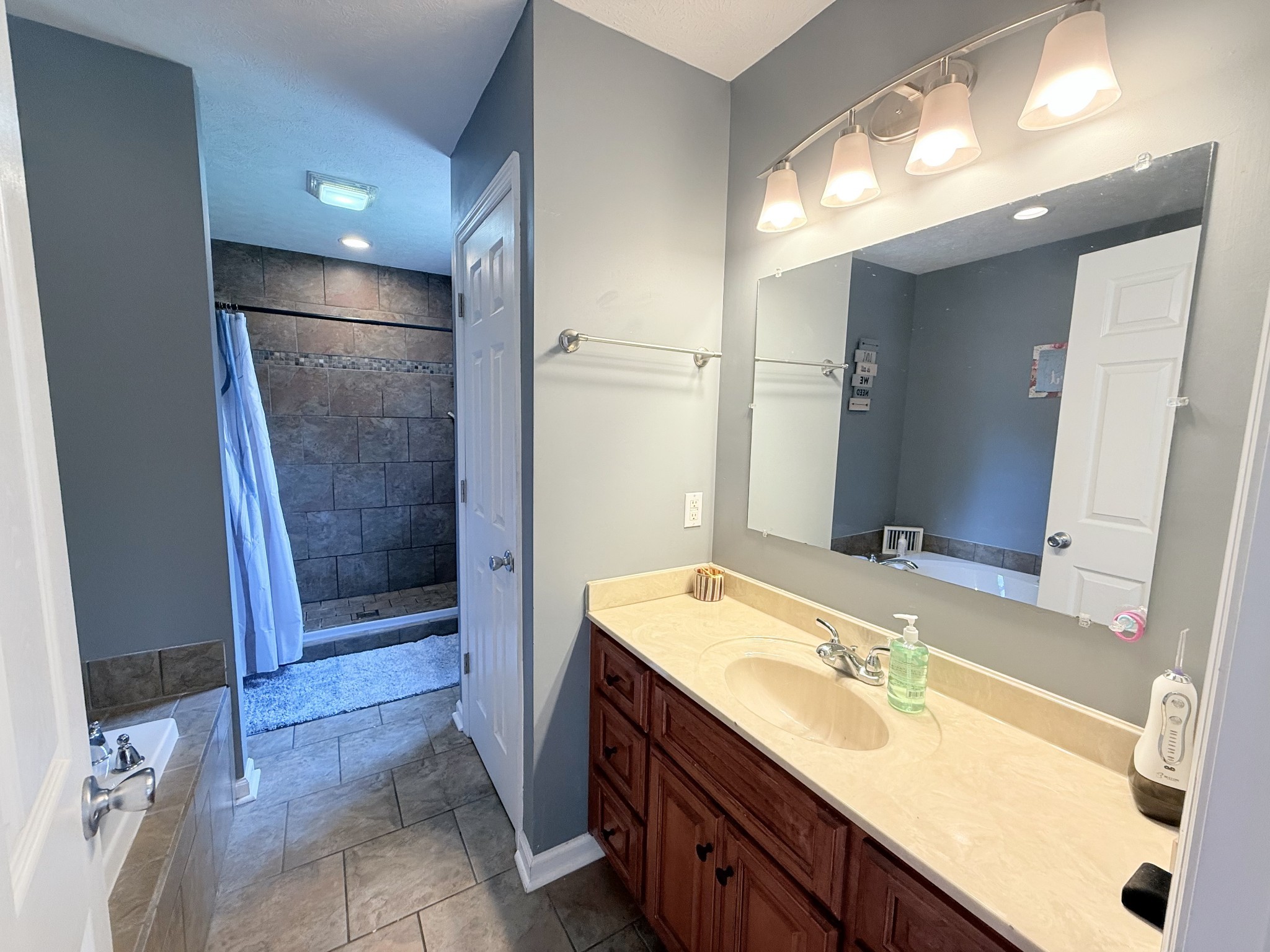 1479 Mt Vernon Road Bethpage, TN 37022 - Photo 14 of 39 a bathroom with a sink double vanity and a mirror