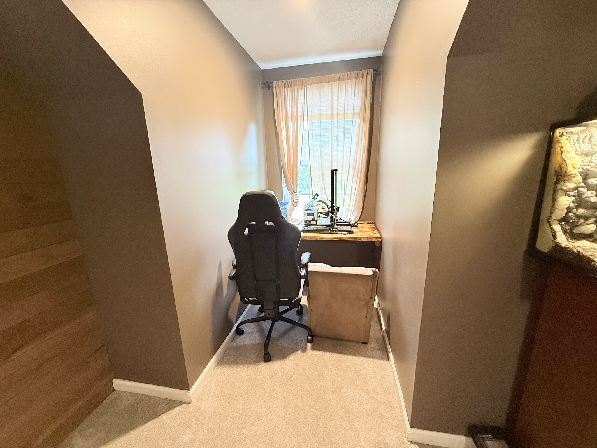 1479 Mt Vernon Road Bethpage, TN 37022 - Photo 20 of 39 a view of a workspace with furniture and a window